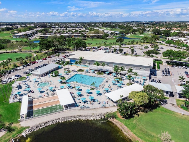 drone / aerial view with a water view