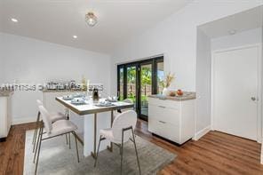 dining area featuring hardwood / wood-style flooring