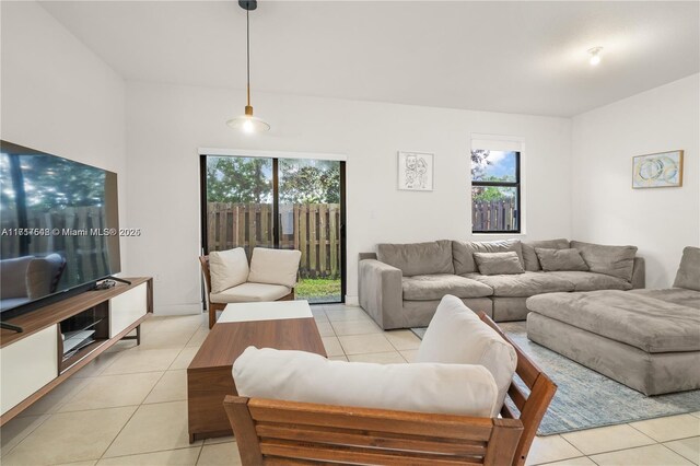 living room with light tile patterned floors