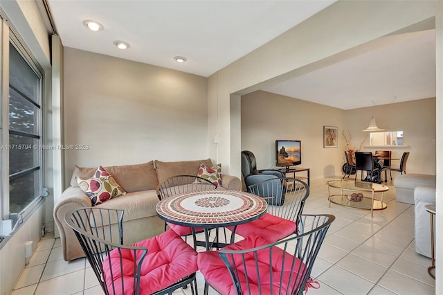 dining area with light tile patterned floors