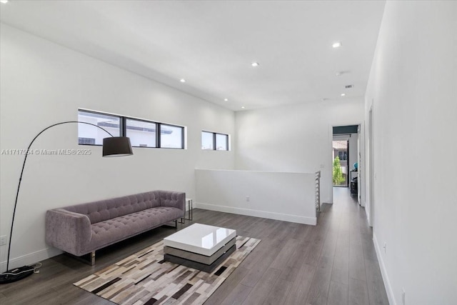 living room featuring hardwood / wood-style floors and a wealth of natural light