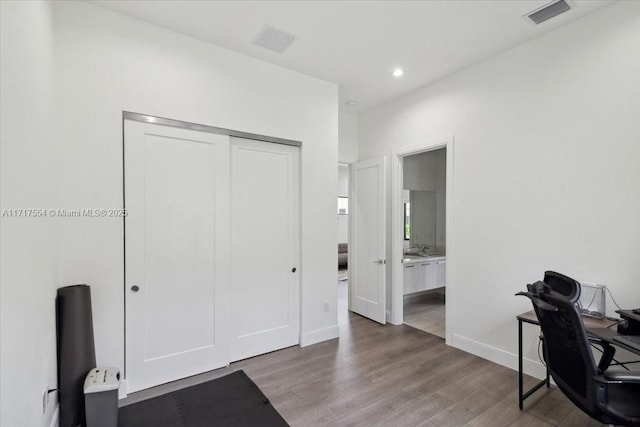 office area featuring hardwood / wood-style floors