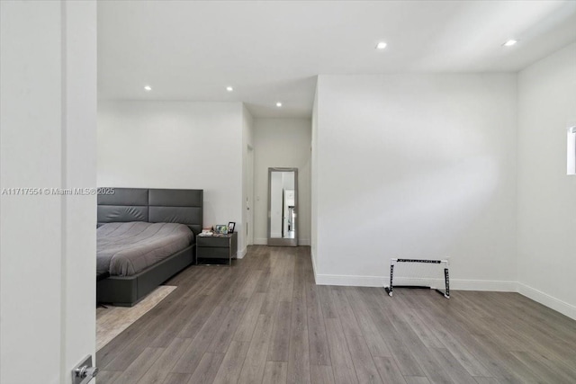 bedroom featuring light hardwood / wood-style floors