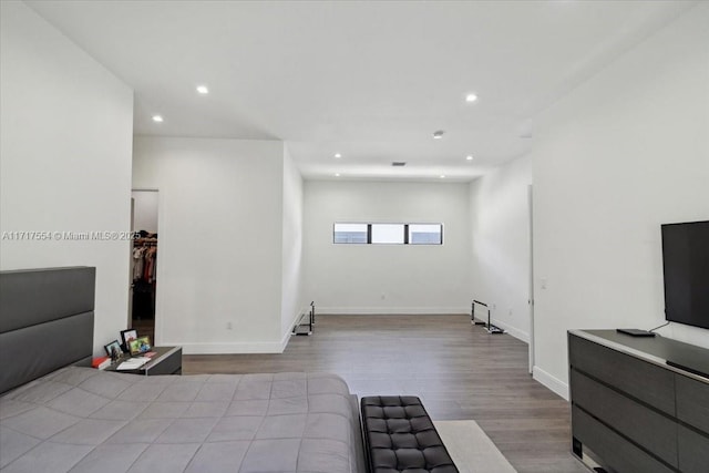 bedroom with light hardwood / wood-style floors