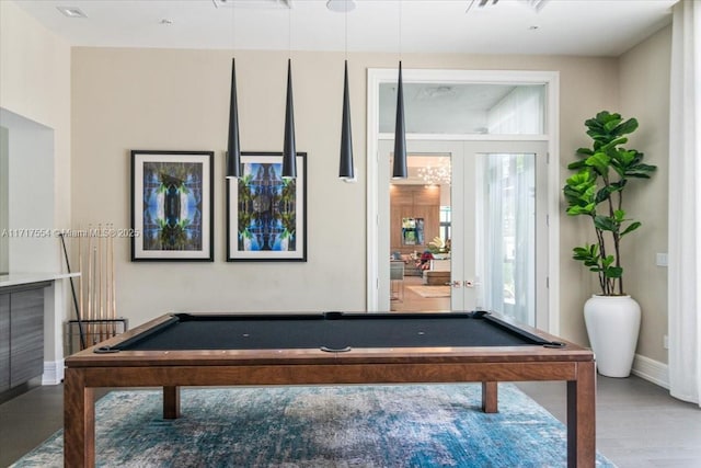 game room featuring wood-type flooring, french doors, and pool table