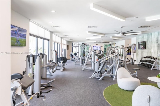 gym featuring ceiling fan