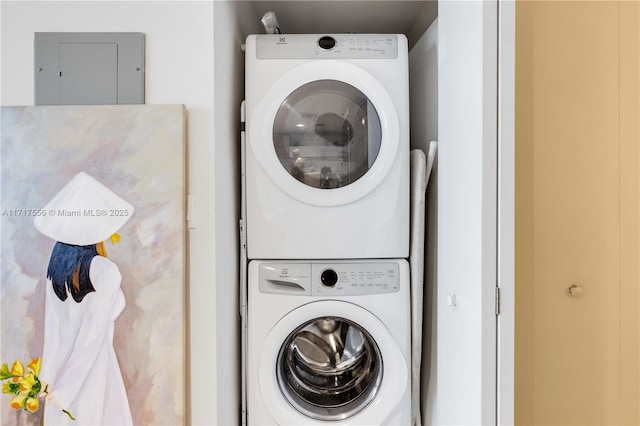 laundry room featuring stacked washer and dryer