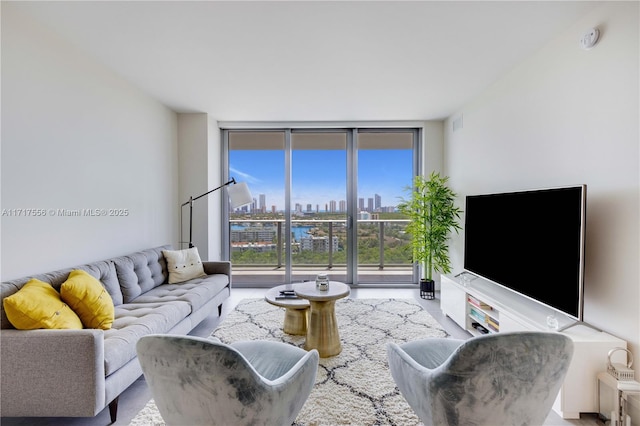 living room featuring floor to ceiling windows