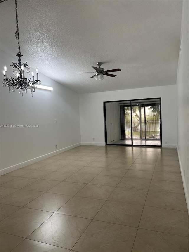 unfurnished room featuring ceiling fan with notable chandelier and a textured ceiling