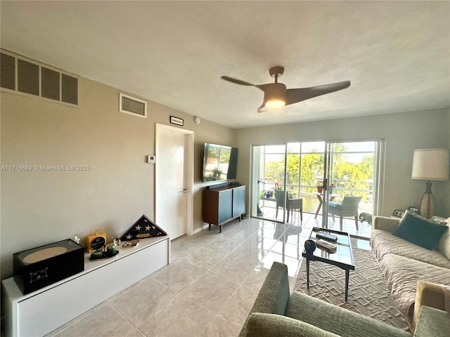 living room with ceiling fan