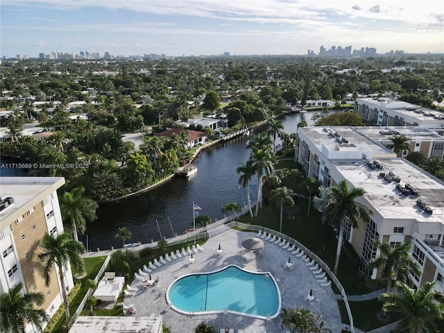 birds eye view of property with a water view