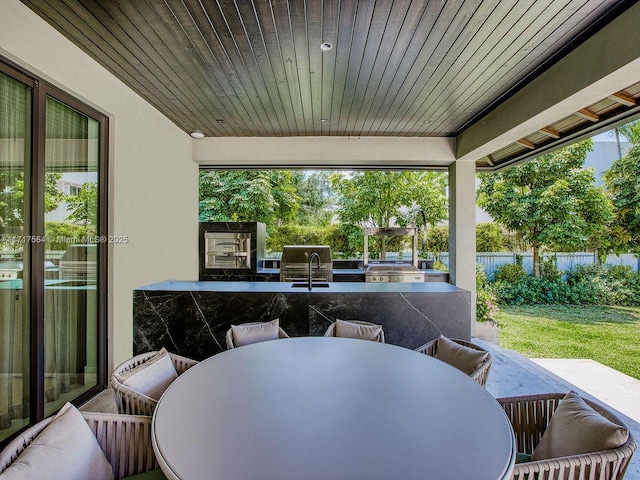 view of patio with an outdoor kitchen