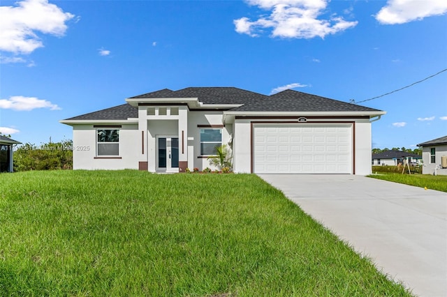 prairie-style home with a front yard, french doors, and a garage