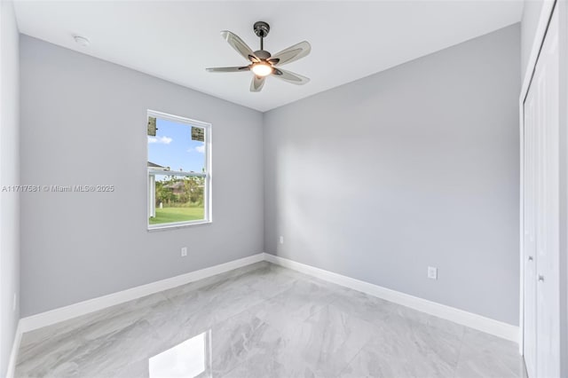 unfurnished room featuring ceiling fan