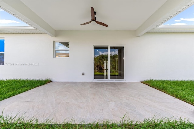 view of patio with ceiling fan