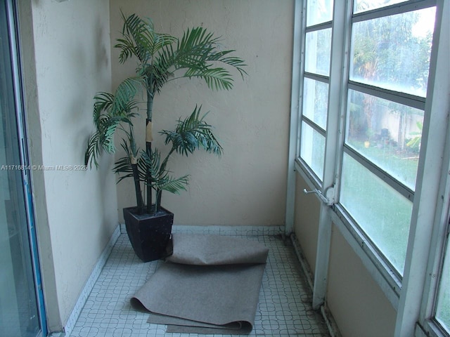 interior space featuring light tile patterned flooring