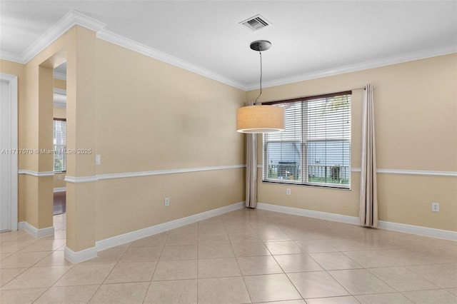 tiled empty room with crown molding