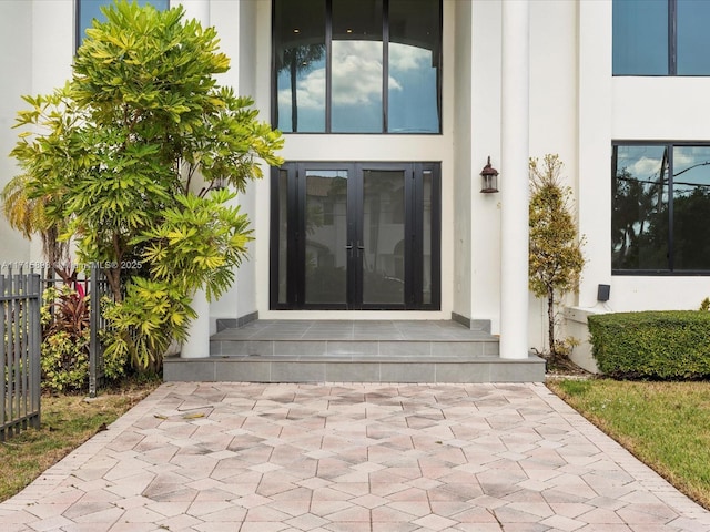 property entrance featuring french doors