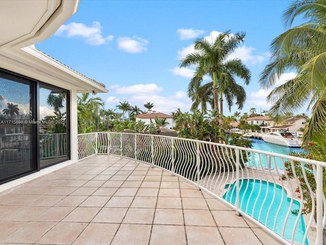 view of patio featuring a balcony