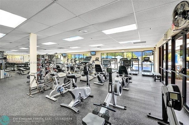 exercise room featuring a paneled ceiling