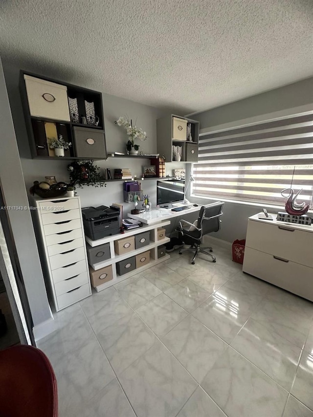 office space featuring a textured ceiling