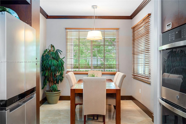 dining room with crown molding