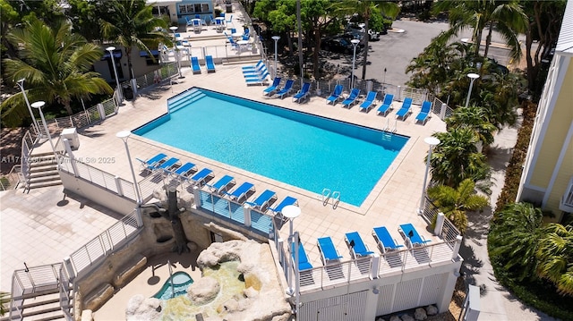 view of swimming pool with a patio area