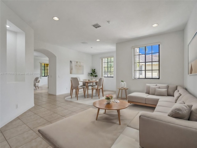 living room with light tile patterned floors