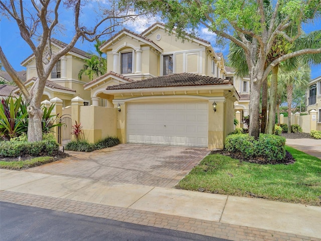 view of front of home with a garage