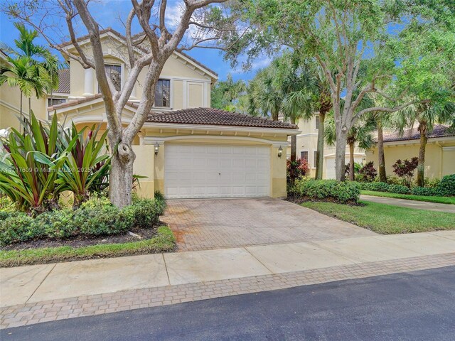 view of front of property with a garage