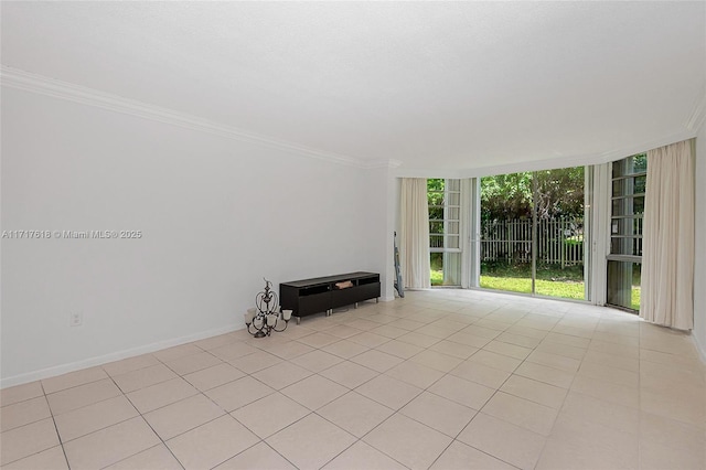 unfurnished living room with a wall of windows, light tile patterned floors, and crown molding