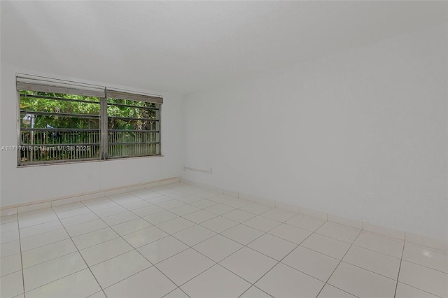 view of tiled spare room