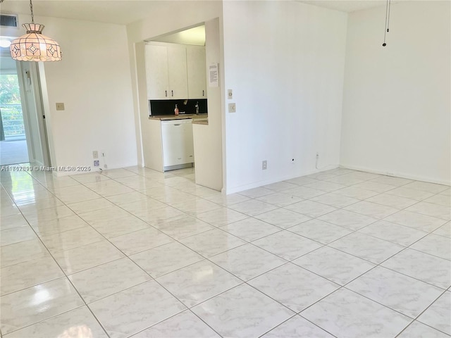 view of tiled empty room