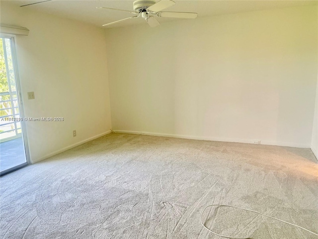 unfurnished room with carpet and ceiling fan