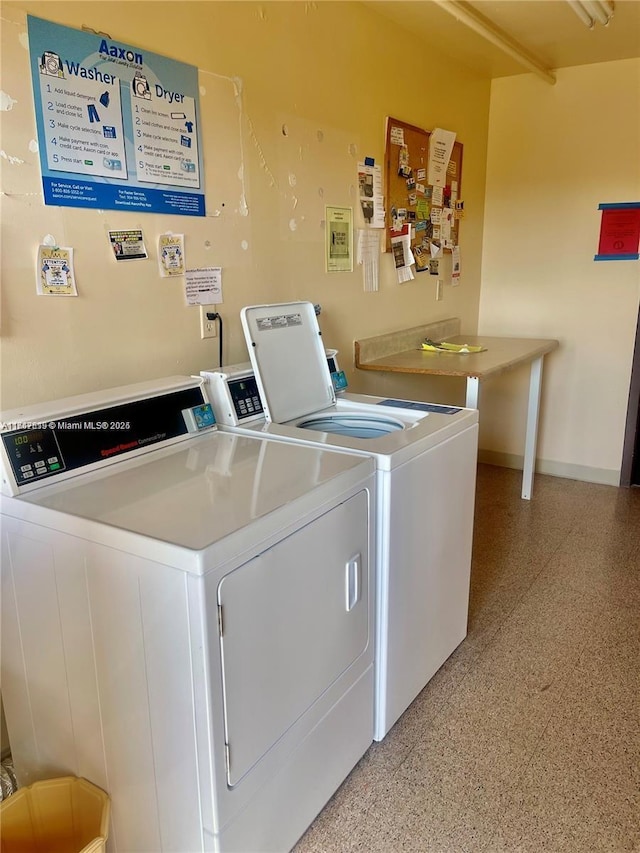 laundry area featuring independent washer and dryer