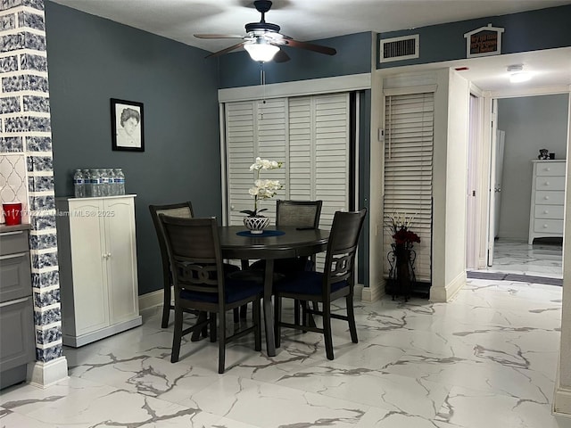 dining room with ceiling fan