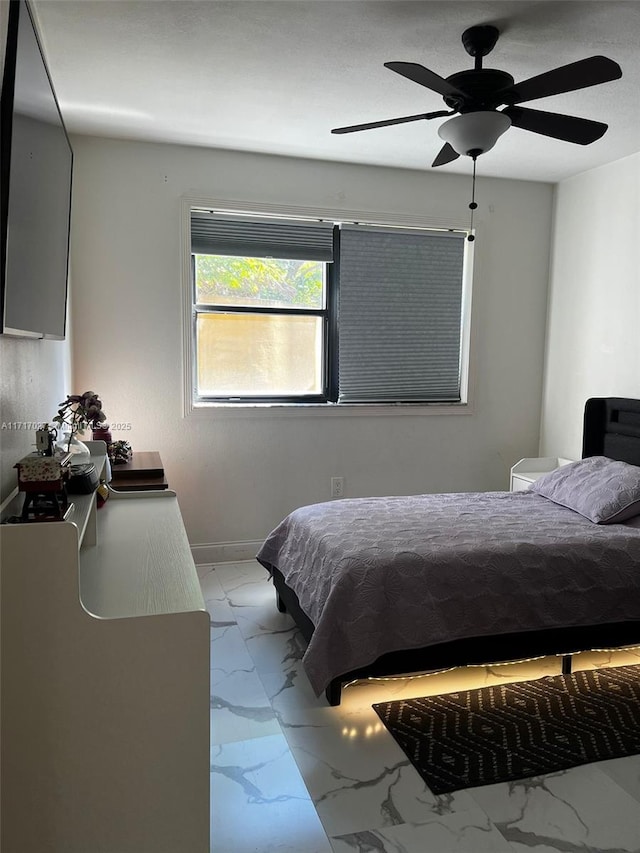 bedroom featuring ceiling fan