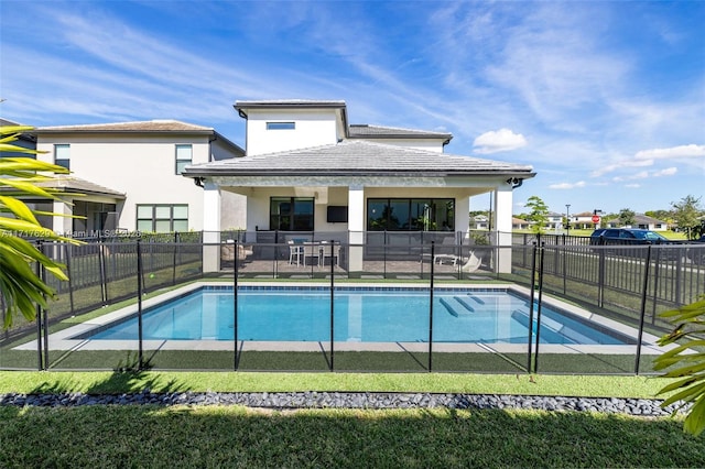 view of swimming pool featuring a patio area