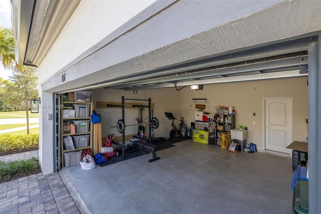 garage featuring a garage door opener