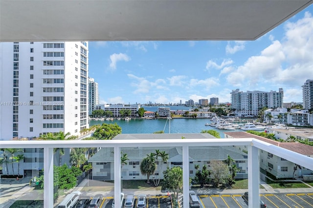 balcony featuring a water view