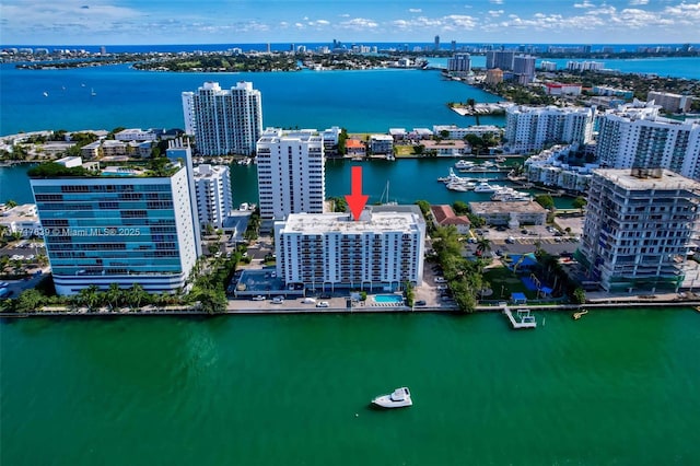 birds eye view of property featuring a water view