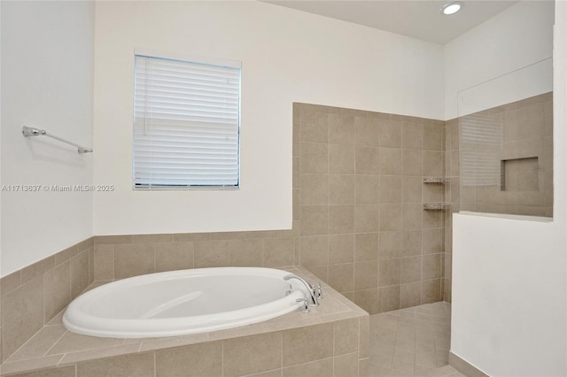 bathroom with tile patterned flooring and independent shower and bath