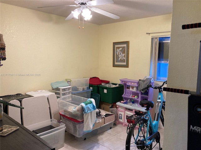 interior space featuring ceiling fan