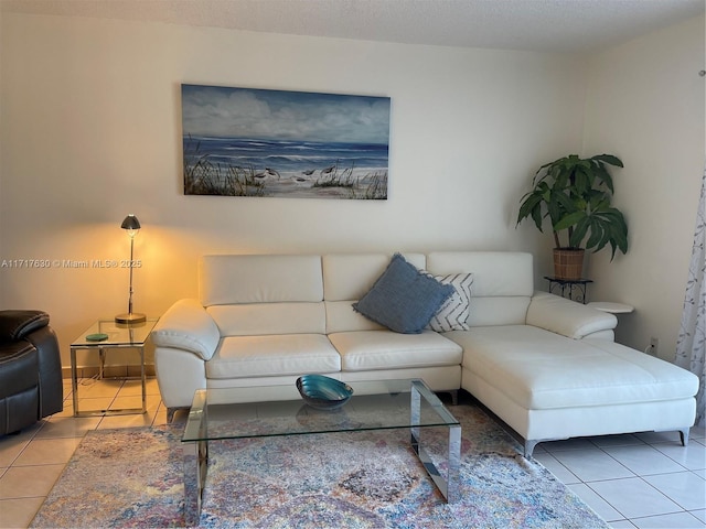 tiled living room with a textured ceiling