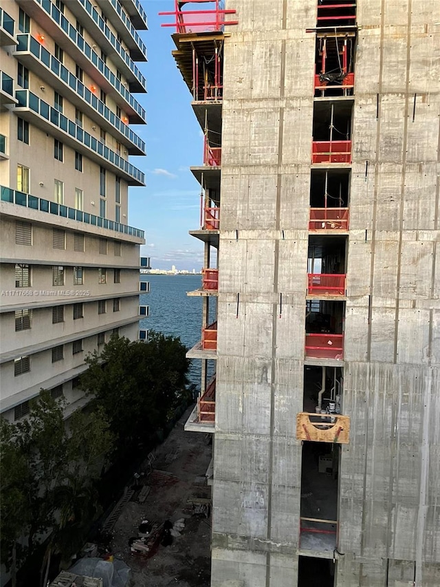 view of property with a water view