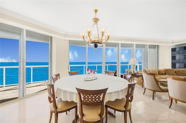 dining area featuring floor to ceiling windows, a water view, ornamental molding, and a notable chandelier