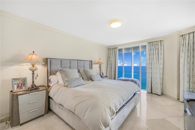 bedroom featuring access to exterior, a water view, and ornamental molding