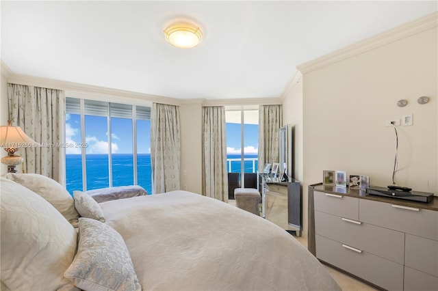 bedroom with access to outside, expansive windows, and ornamental molding