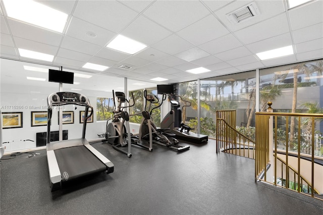 workout area with a drop ceiling