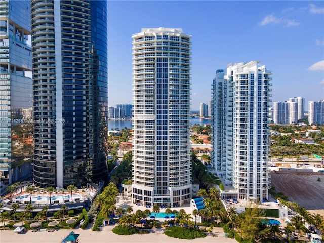 property's view of city featuring a water view